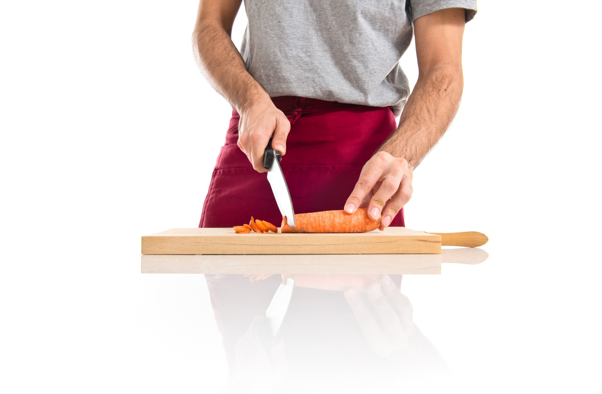 Chef che mostra tecnica di taglio